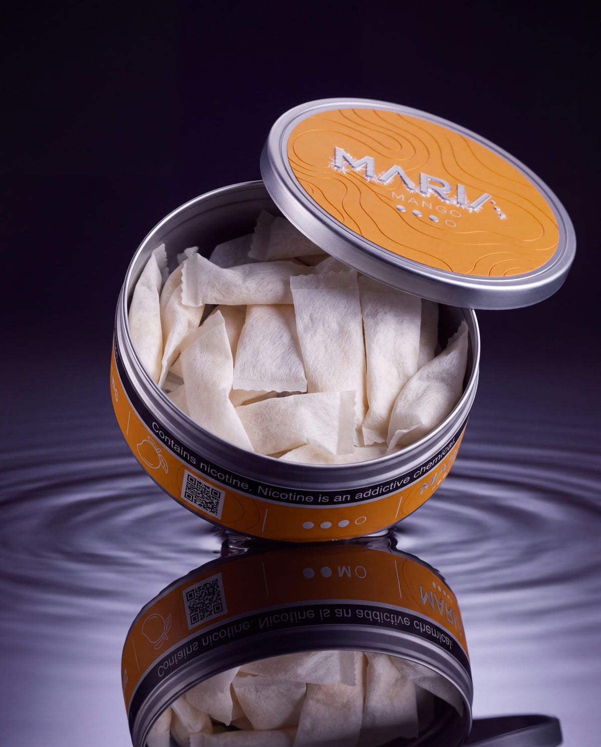 MARIA Mango can, lid open showing pouches